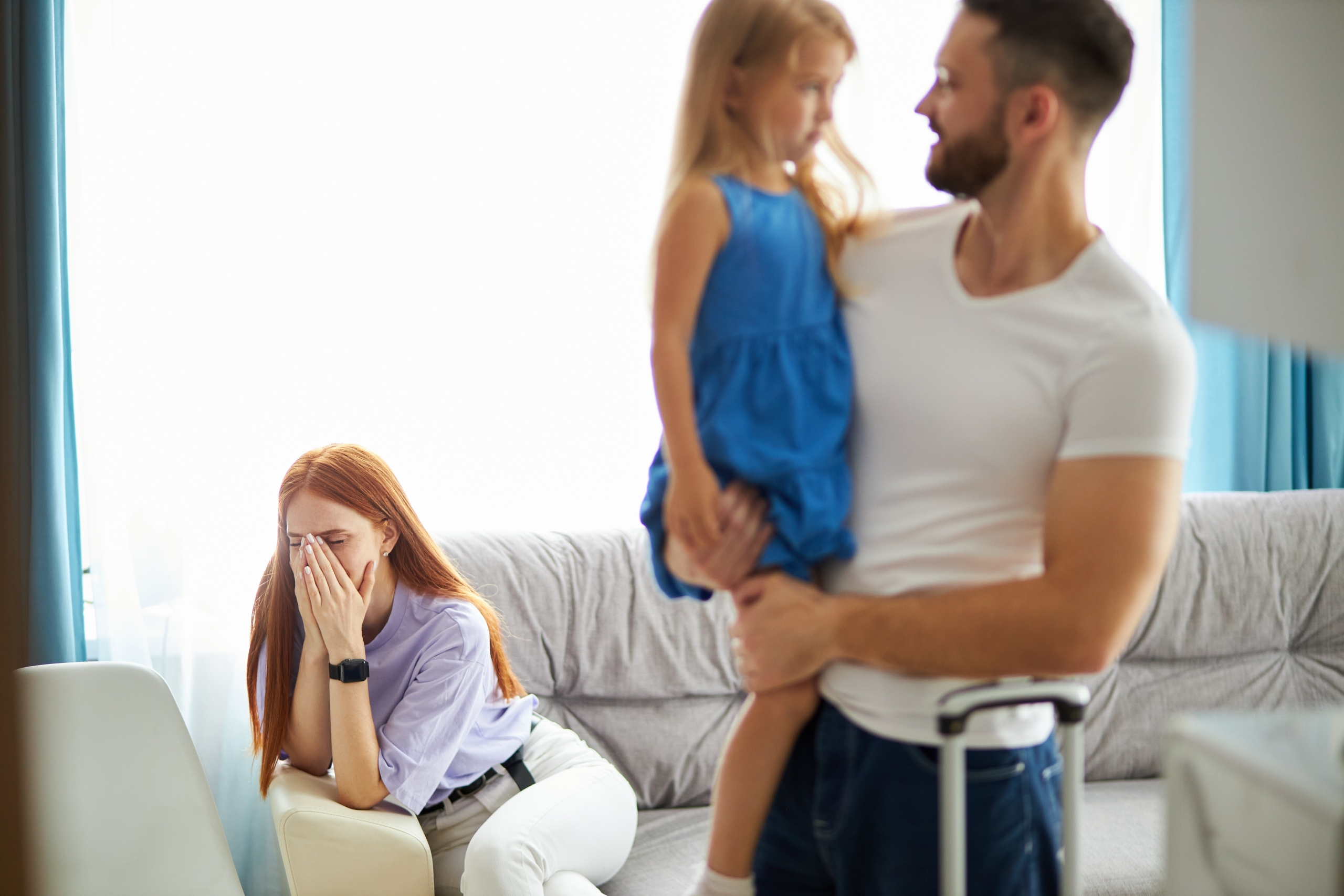 redhead woman is cryng after quarrel with husband mum and dad learning how to co parent after splitting up