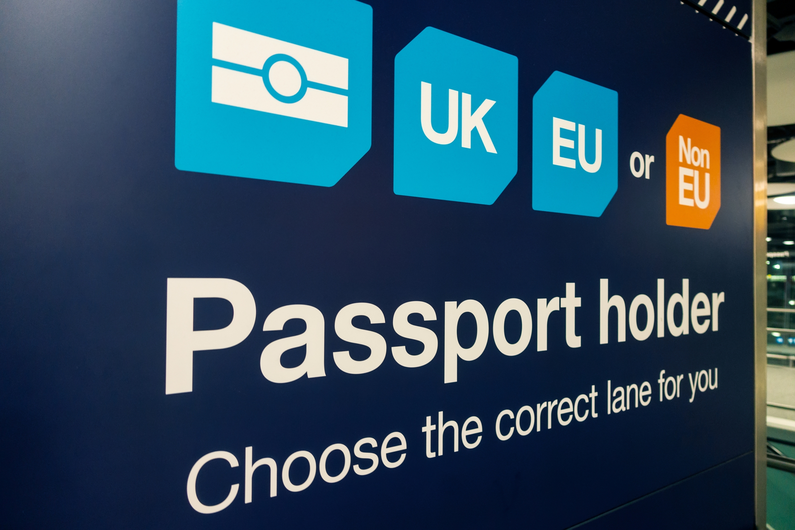 Passport Control and UK Border at Heathrow Airport London England "Passport control desk symbolising immigration issues intersecting with divorce, a topic covered by OLS Solicitors in England and Wales."