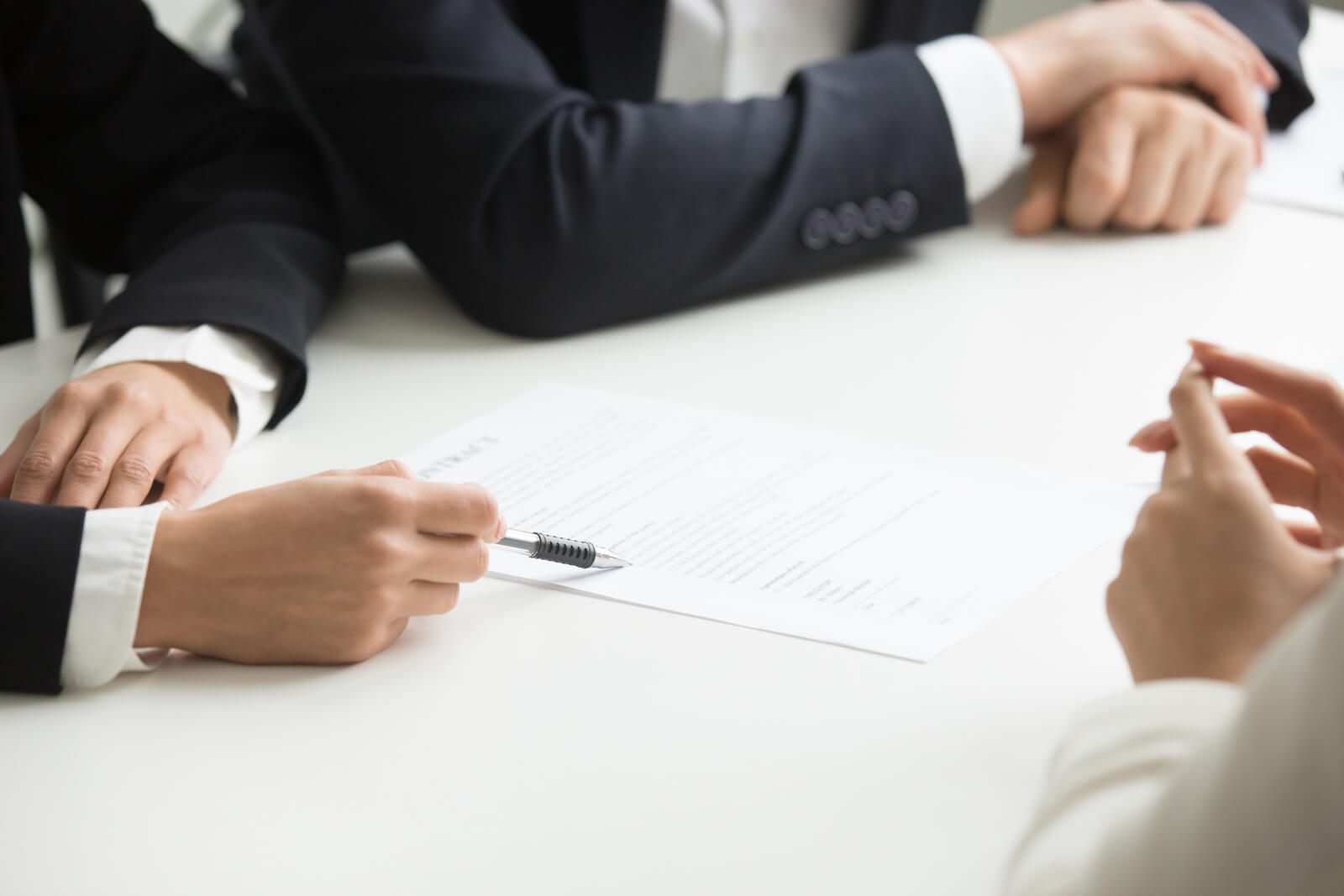 negotiations-about-contract-terms-concept-hand-pointing-document-closeup (1) (1) consent iorder in divorce review